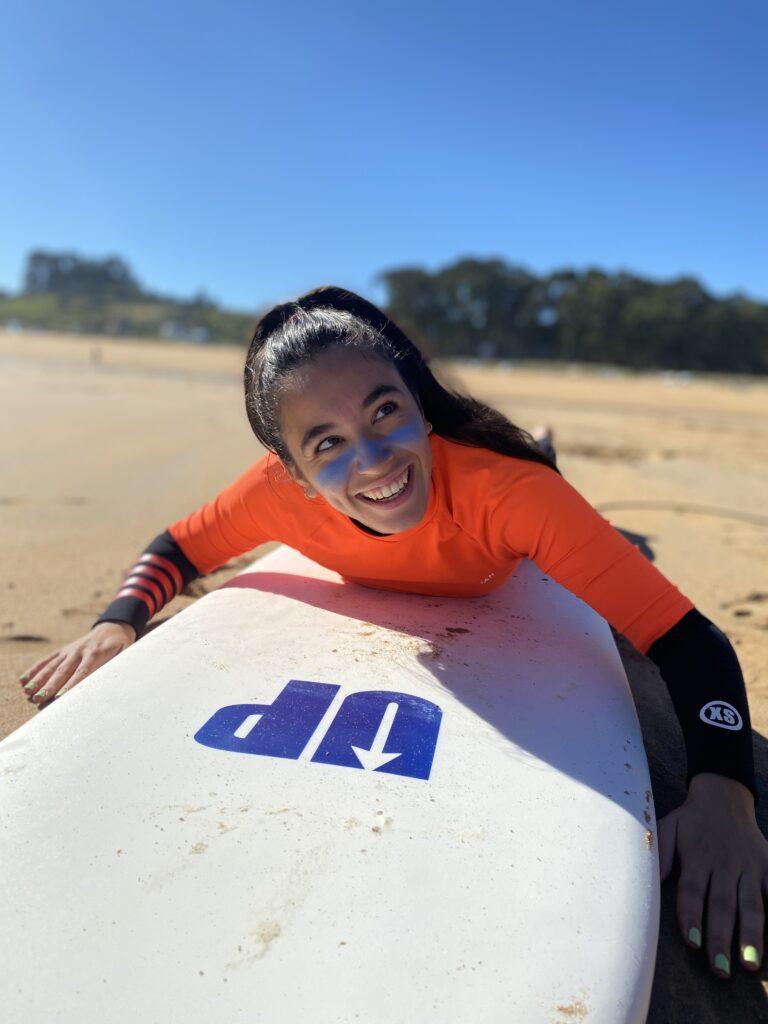 Girl doing surf at summer camp